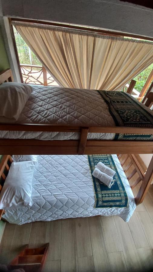 Отель El Guayabal De Миндо Номер фото